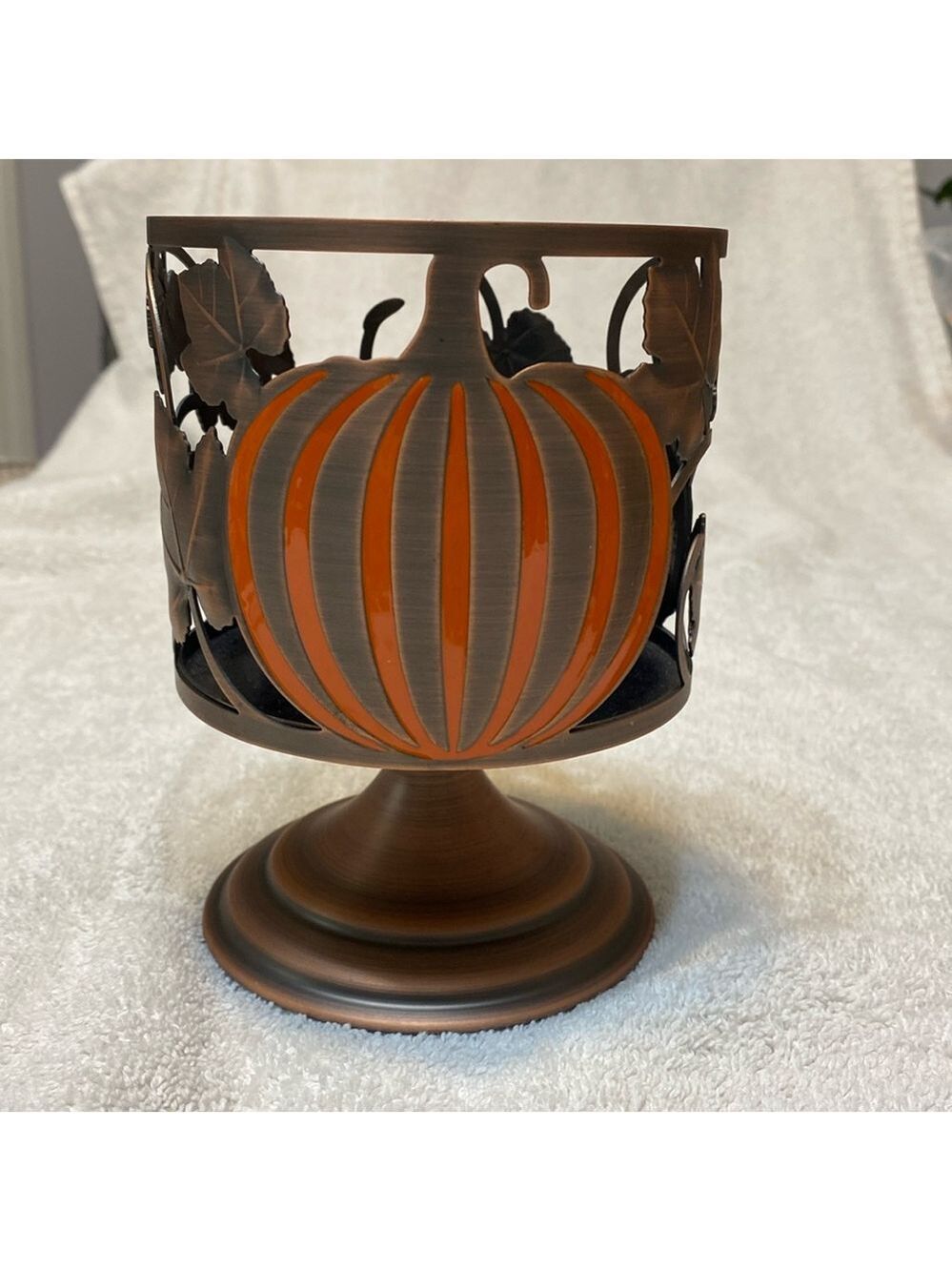 Retired Bath and Body Works Pumpkin candle holder, pedestal style.